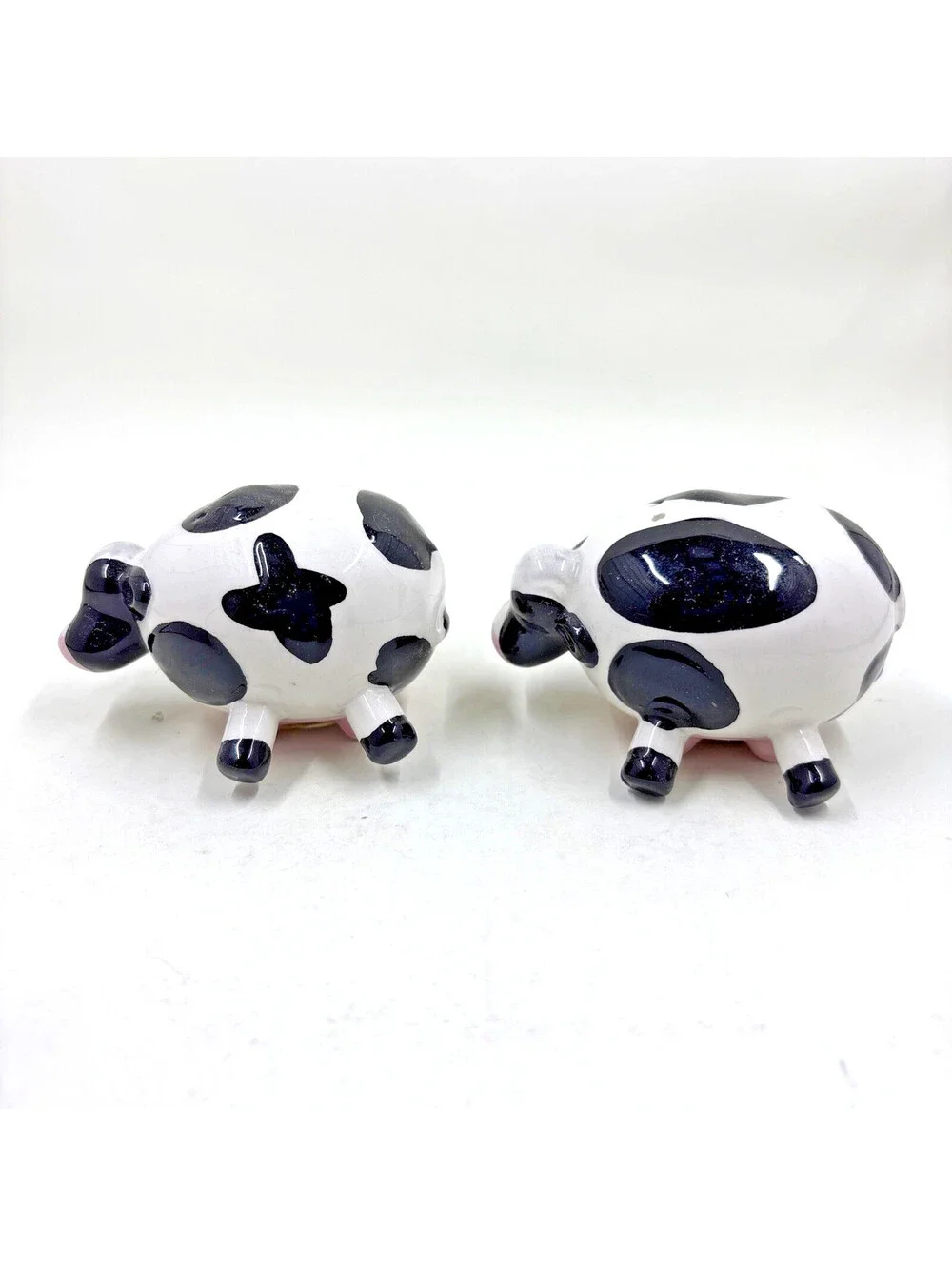 Farmhouse Style Mini Cow Salt and Pepper Shakers Resting on Utters 2.5